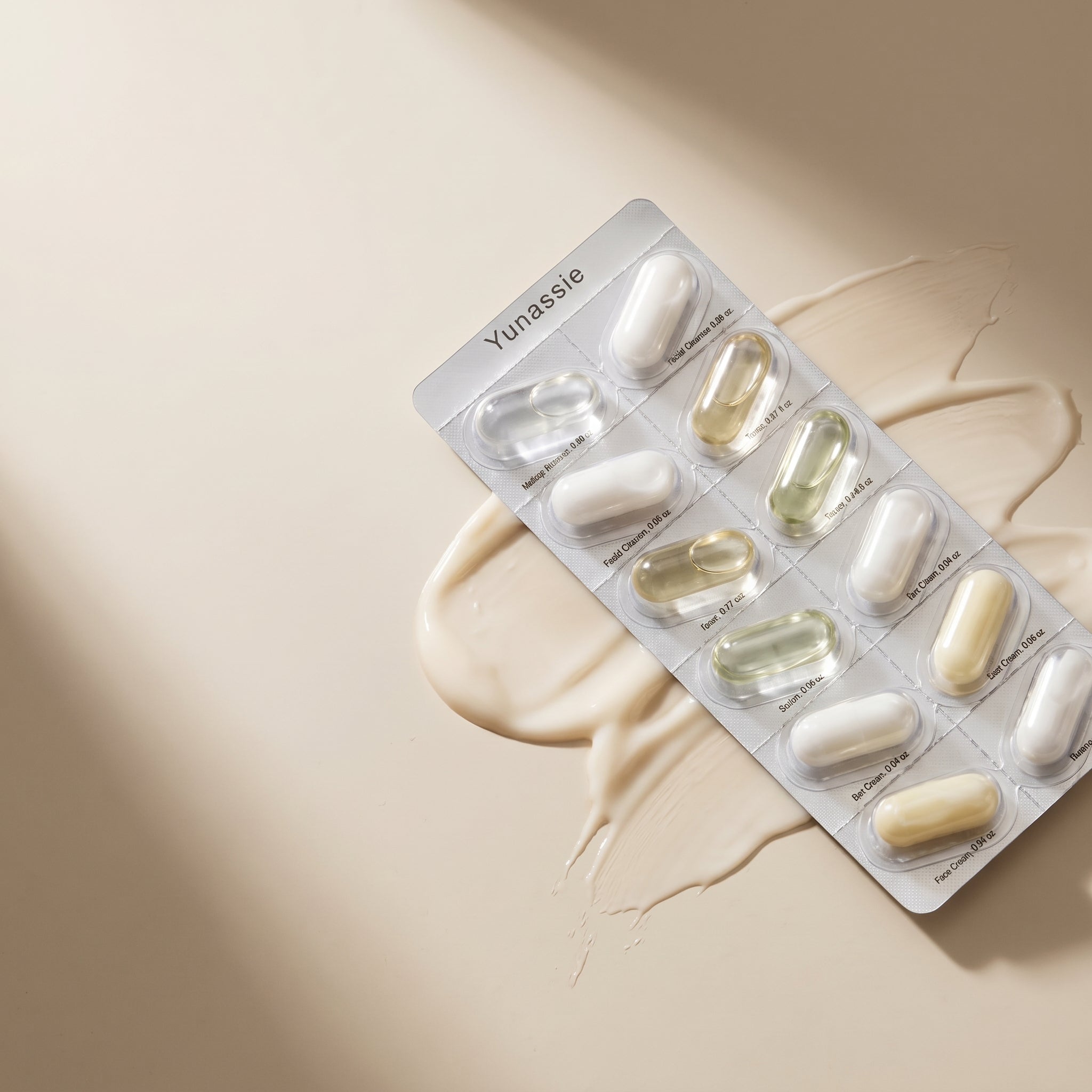 Blister pack of Yunassie supplements on a beige background